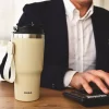 Kubek termiczny DUKA RESA 600 ml kremowy stalowy